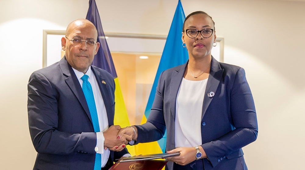 Minister of Sports Mimosa Aurore Munyagaju and Kerrie Symmonds, Minister of Foreign Affairs and Foreign Trade of Barbados during the signing of a partnership agreement in Sports Development in Kigali on November 9. Courtesy