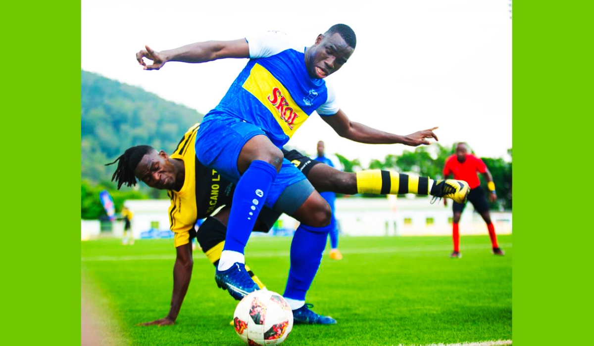 Rayon Sports striker Musa Camara controls the ball against Mukura VS defenders during a 2-2 draw league game on Sunday, November 20. Courtesy