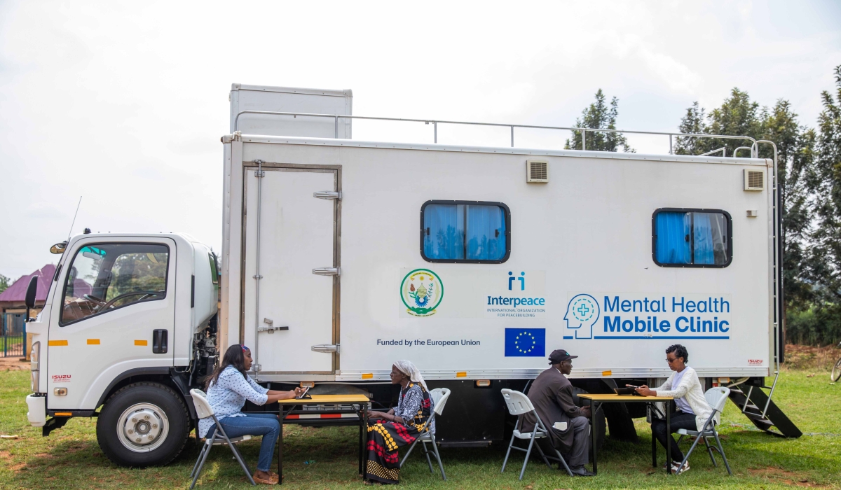 Specialists on mental health during an outreach program to meet residents upcountry for raising awareness on mental health issues. Courtesy