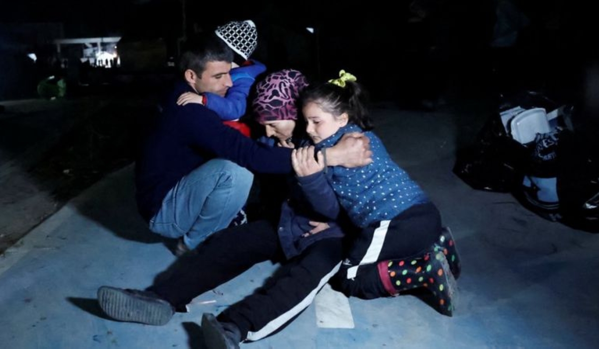 People react after a 6.4 magnitude earthquake hit in Antakya, southern Turkey, on Monday. Photo by Reuters