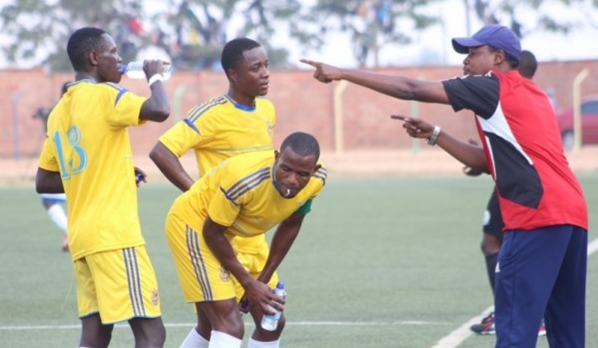 AS Muhanga head coach Abdu Mbarushimana gives instruction to his players during the game. File