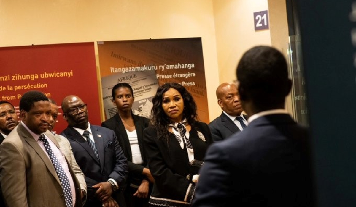 The visiting delegation listens attentively during a lecture on the history of the 1994 genocide against the Tutsi.