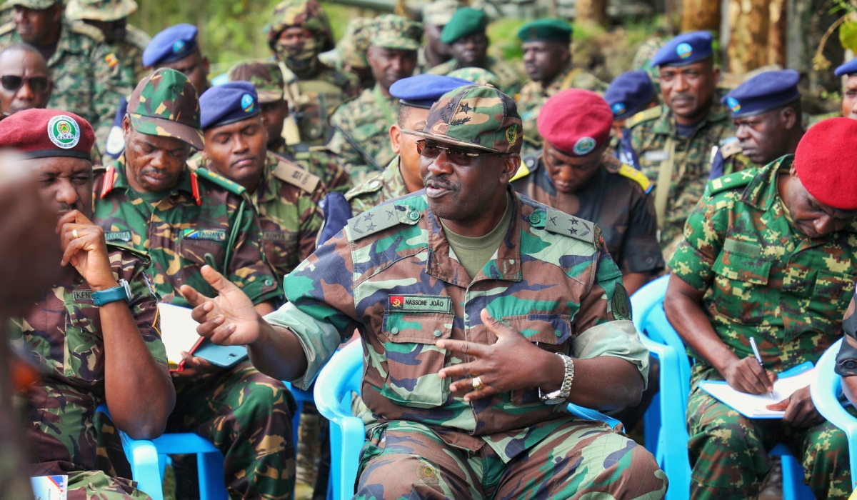 Angolan Lt Gen Nassone João, head of the ad-hoc verification mechanism (AVM) comprising officers from Angola, Rwanda, and DR Congo talks to the Commander of EACRF, Maj Gen Jeff Nyagah and other members of the Joint Bureau comprising the AVM, EACRF, EJVM and EAC-MVM.