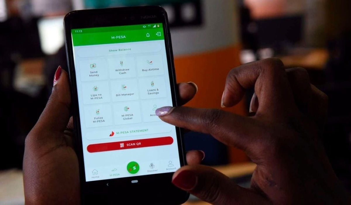 A user sending money on M-Pesa. Photo_NMG