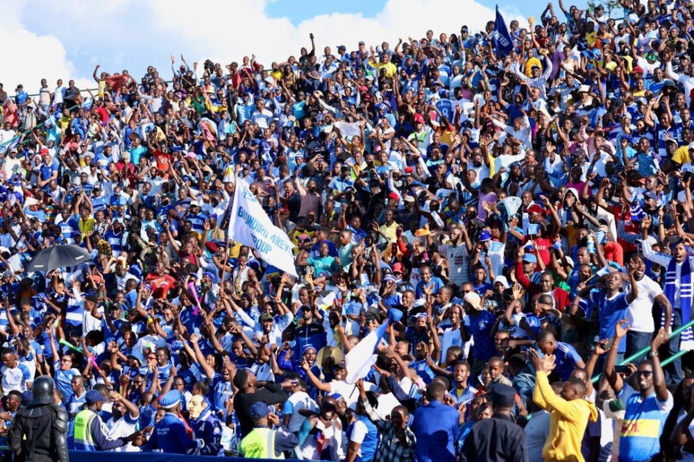 Thousands of the Blues supporters celebrate as Rayon Sports  mark a 1-0 Peace Cup final victory  over Army side to be crowned champions at Huye Stadium on Saturday.