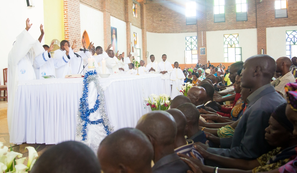 Clerics pray for church members who committed Genocide after asking for forgiveness to the survivors during a mass at Nyamata Catholic Church in 2017. File