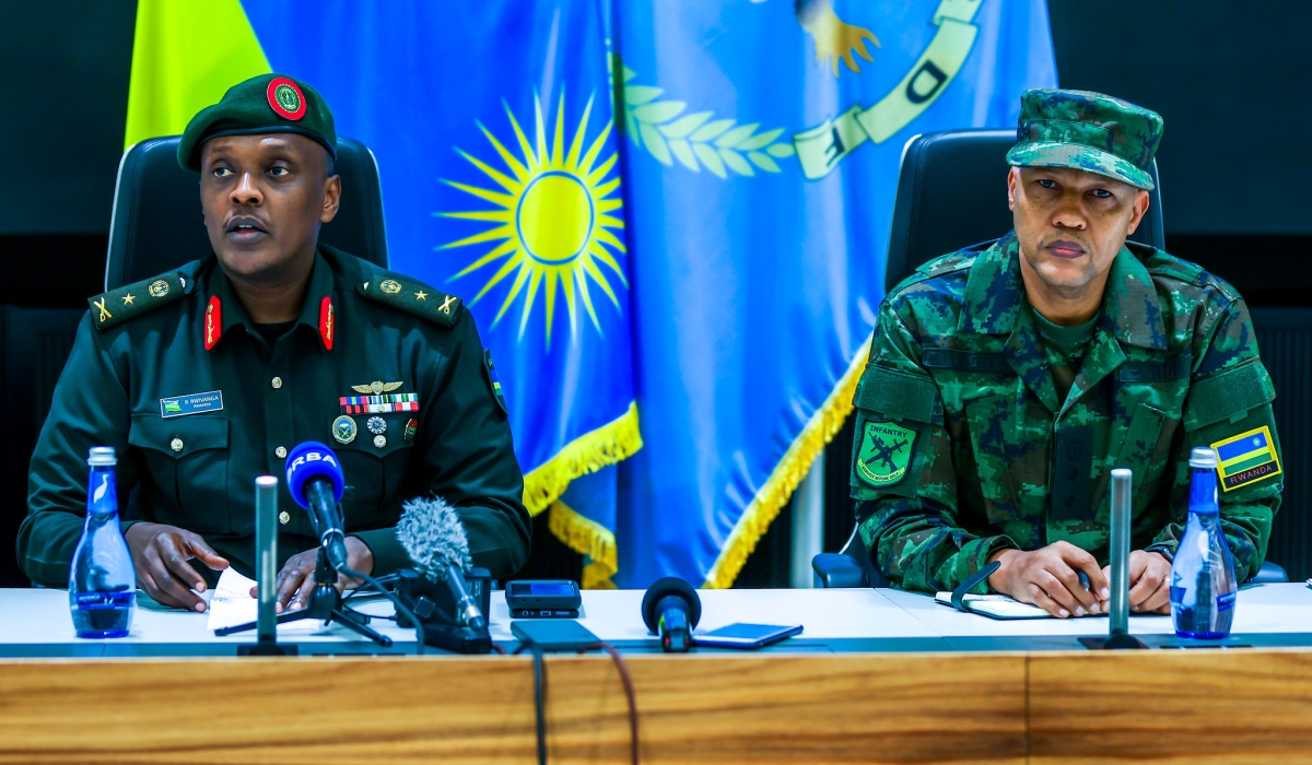 Rwanda Defence Force spokesperson Brig Gen Ronald Rwivanga and Col Lambert Sendegeya, in charge of RDF personnel or Chief J1, address journalists during a news briefing at the RDF headquarters in Kimihurura on Wednesday, June 14. The two senior officers shed light on recent developments that involved dismissal of two generals. Photo by Olivier Mugwiza