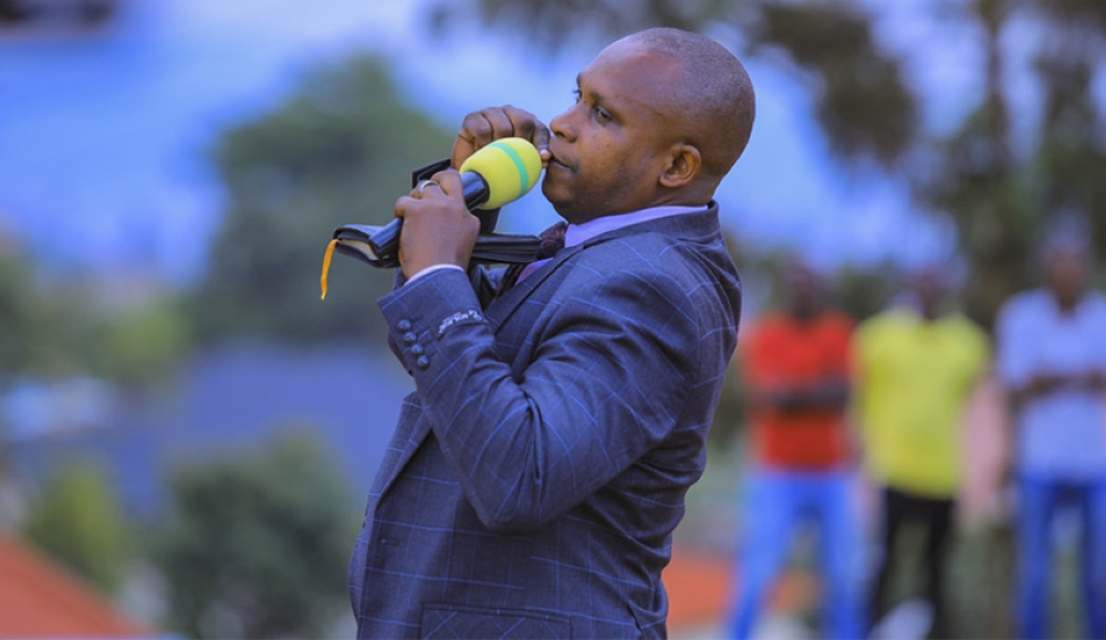 Pastor Theogene Niyonshuti of ADEPR Church, makes a gesture while preaching. The father of four died in a fatal accident in Kampala on Thursday night