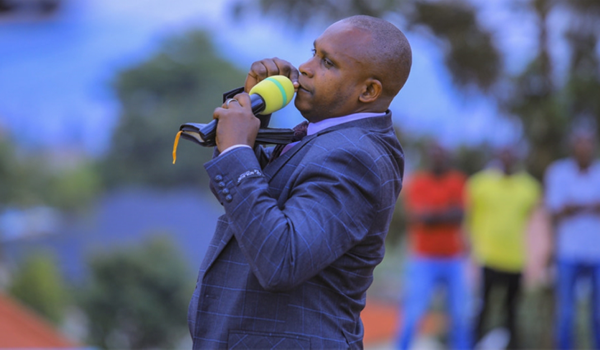 Pastor Theogene Niyonshuti of ADEPR Church, makes a gesture while preaching. The father of four died in a fatal accident in Kampala on Thursday night