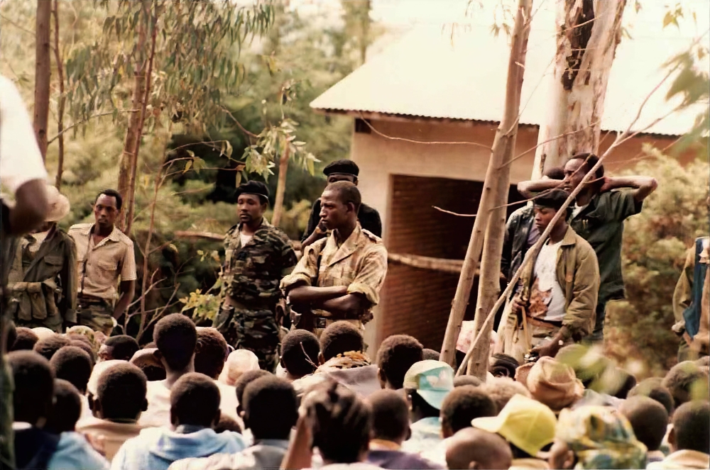 RPA soldiers speaking to Genocide survivors in Bugesera District after rescuing them. Bugesera was one of the worst hit regions during the 1994 Genocide against the Tutsi. Majority of the survivors were rescued by RPA soldiers from marshlands.