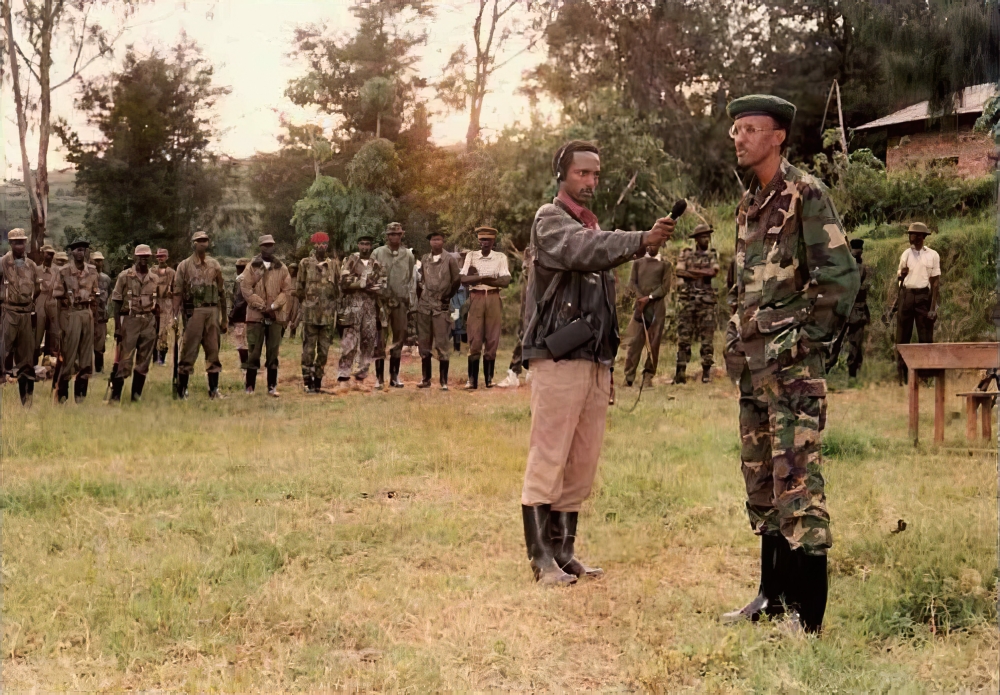 Muhabura Radio reporter Anaclet Kalibata interviews the Chairman of the RPA High Command Maj Gen Paul Kagame during the liberation struggle in the 1990s..