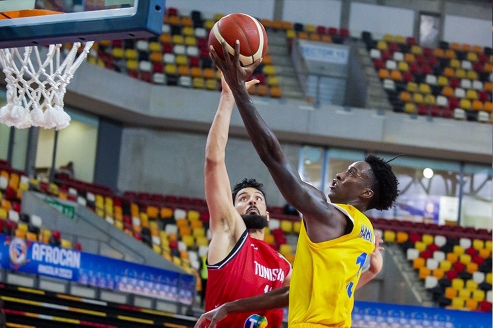 Rwanda&#039;s Ntole with the ball against Tunisia  Rwanda lost the game with 61-67 in Saturday’s Group C opening game held at Arena Kilamba in Luanda.