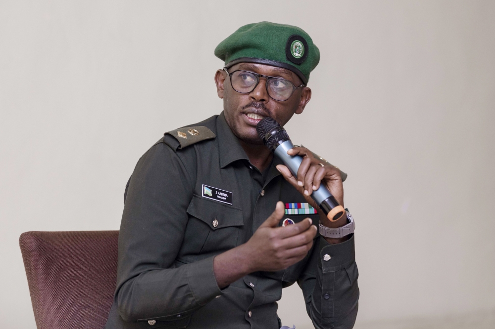 Lt. Col. Simon Kabera, RDF Deputy spokesperson addresses youth during a meeting on Sunday, July 23. Photos by Murengerantwari