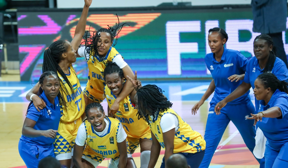 National Basketball team players celebrate the victory. Rwanda qualified for the semifinals of the FIBA Women’s Afrobasket after beating Uganda 66-61 in a tense quarterfinal clash held at BK Arena on Wednesday night. PHOTOS BY Dan Gatsinzi Kwizera