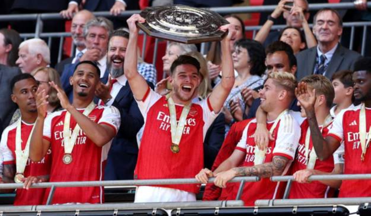 Arsenal players celebrate the Community Shield after beating Manchester City in penalty shootouts-Getty Images