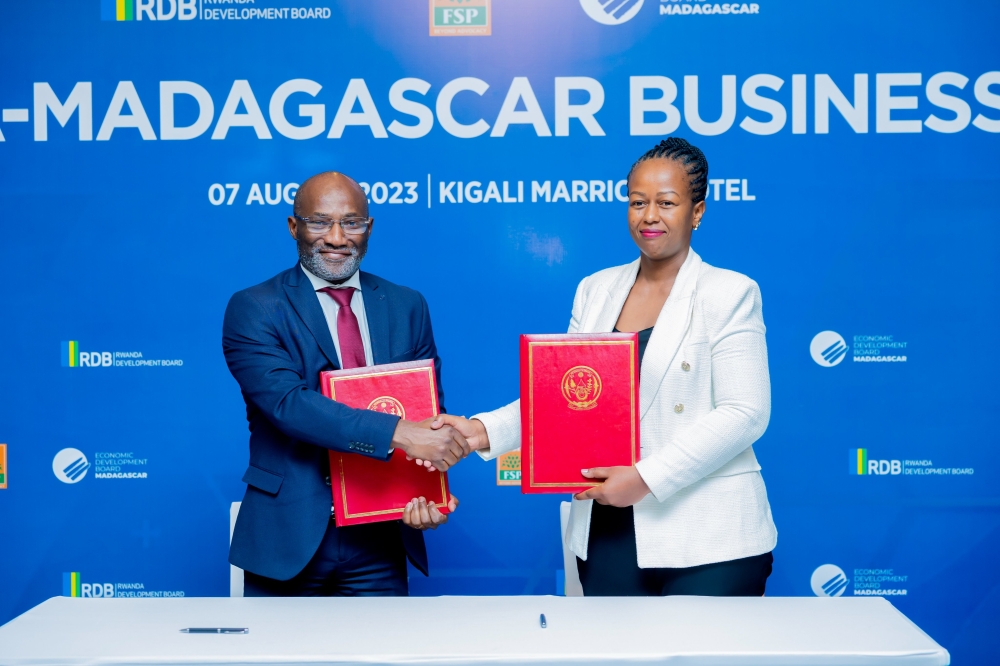 Jeanne-Françoise Mubiligi, the acting Chairperson of PSF and Guy Foka, the President of the International Commission of Groupement des Entreprises de Madagascar (GEM) during the signing event on August 7. COURTESY PHOTOS