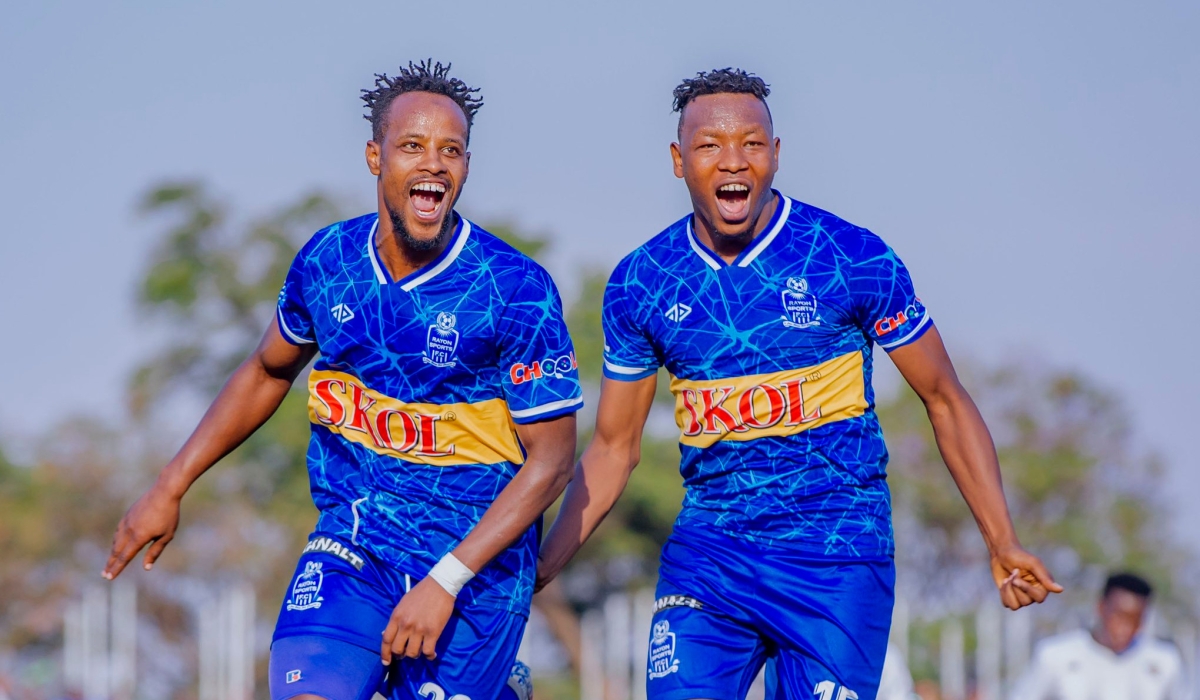 Rayon Sports midfielder Rashid Kalisa (L) with defender Aimable Nsabimana celebrate Kalisa&#039;s goal as the Blues shocked rivals APR FC 3-0 to win the 2023 Super Cup title on Saturday, August 12. Courtesy