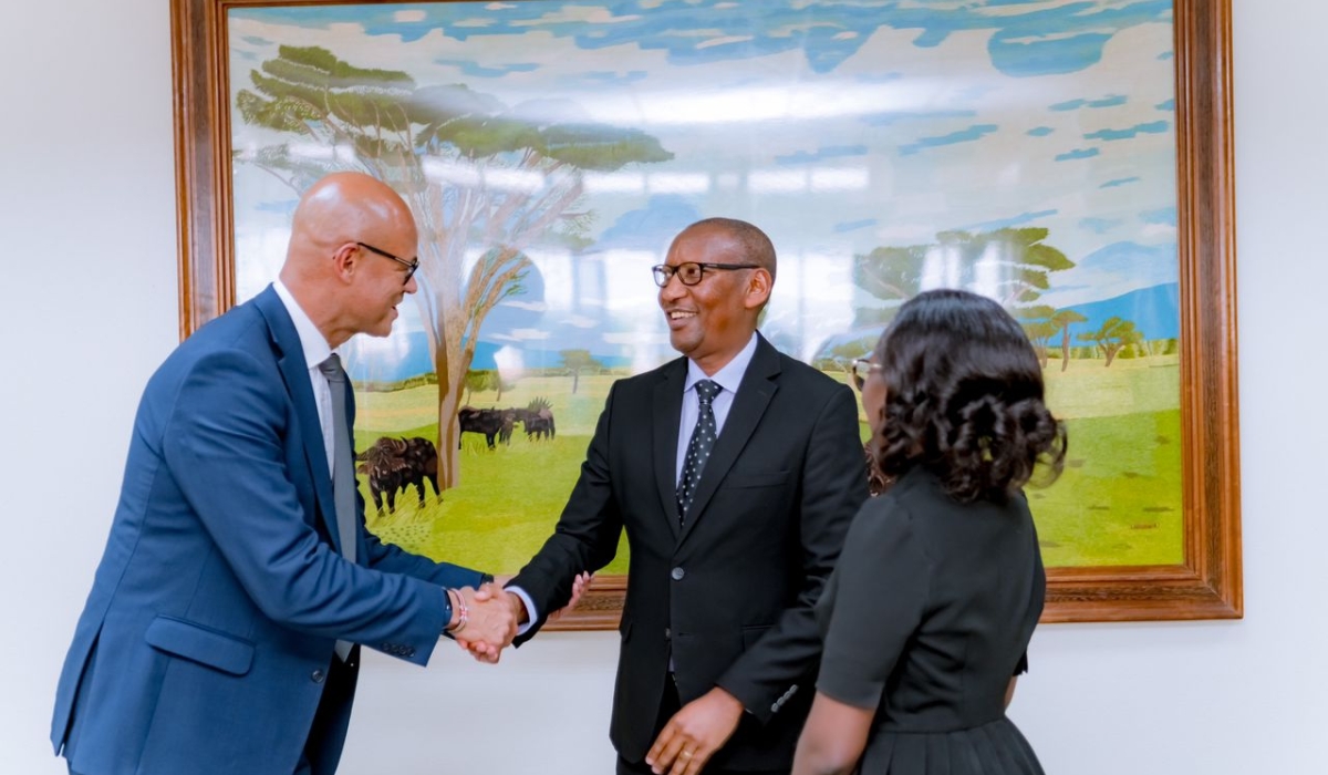 Jeremy Awori, the CEO of Ecobank Transnational Group meets with Central Bank Governor John Rwangombwa during his visit to Rwanda on August 18. Courtesy