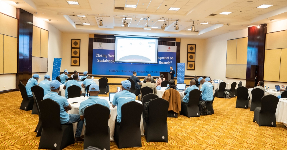 Participants follow a presentation during the closing workshop on the project in Kigali, on September 29.