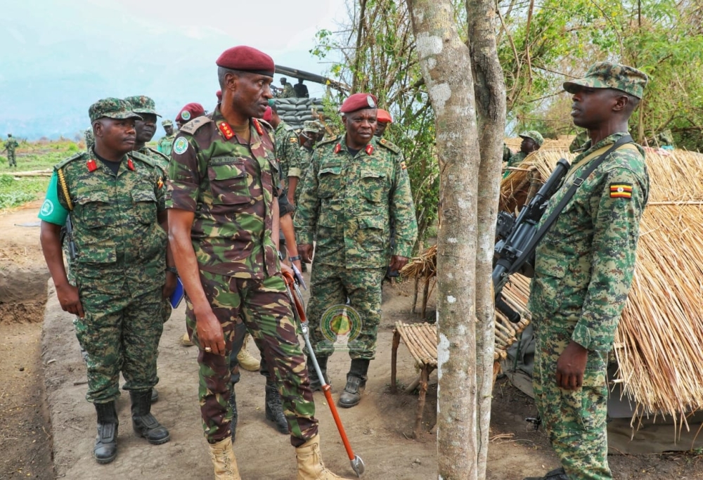 The Force Commander of the East African Community regional force, Maj Gen Aphaxard Kiugu, and other officers, visit Ugandan EACRF contingent, on August 12, in Rutshuru territory, eastern DR Congo. It remains unclear how the regional force will react to renewed hostilities. Photo: courtesy of EACRF