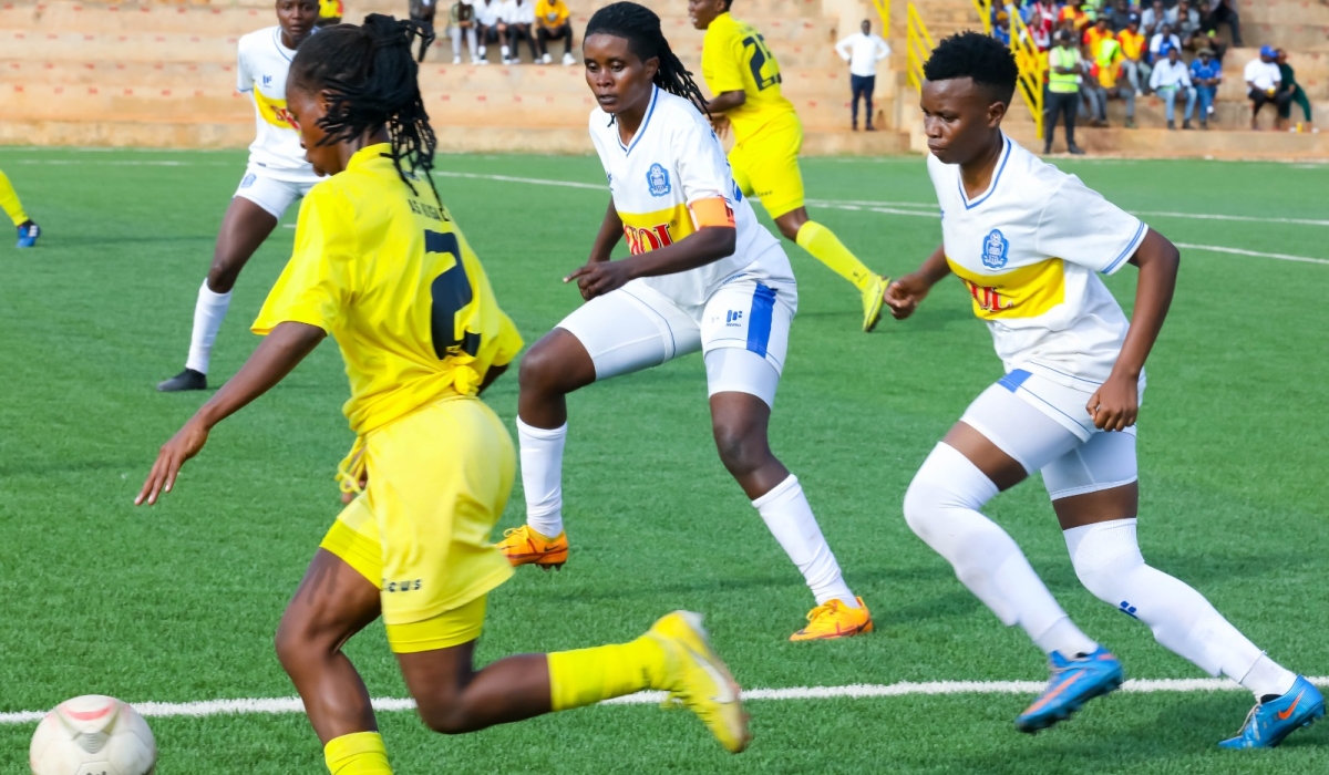 AS Kigali player wins the ball against Rayon Sports WFC during a 1-1 draw at Nzove SKOL Stadium on Saturday October 14. ALL PHOTOS BY CRAISH BAHIZI
