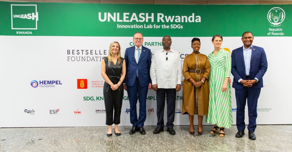 PM Ngirente poses for a photo with senior delegates at the opening ceremony of Unleash Rwanda conference in Kigali on December 2.The week-long event, taking place from December 2 to December 8, has gathered 1,000 youth from 136 countries .Courtesy