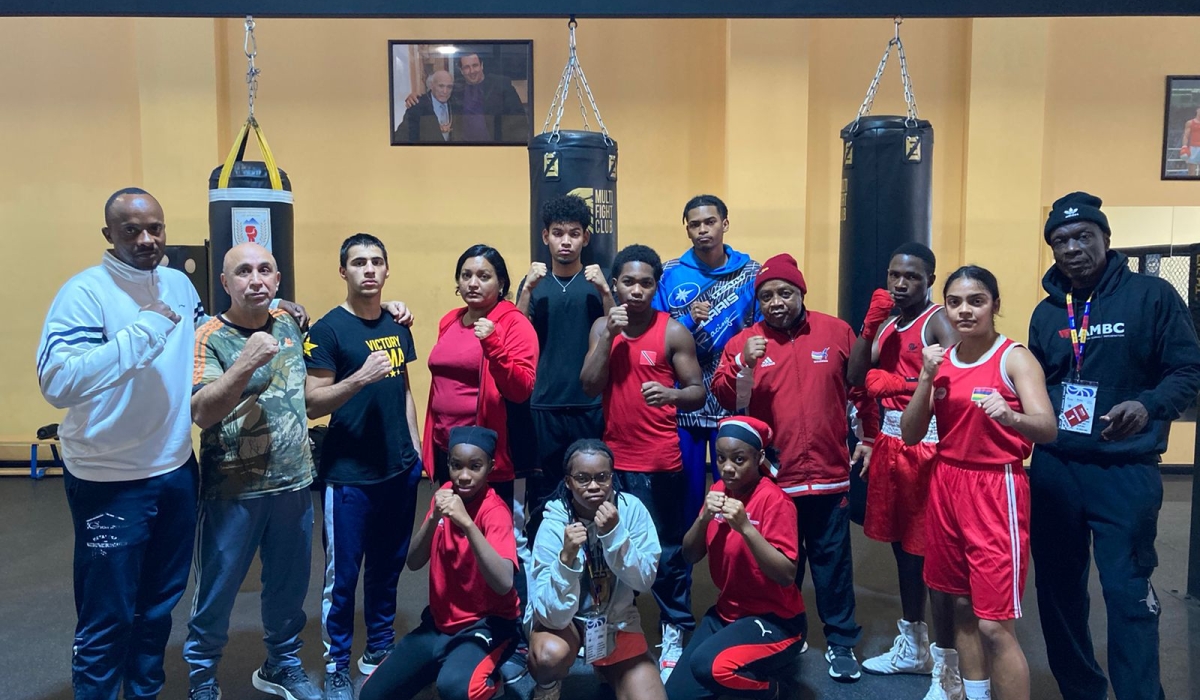Rwanda national coach Jean-Claude Gatorano (left) and boxer Valentin Ntabangayimana (3rd from right), pose with other boxers during their stay in the Armenia capital Yerevan.