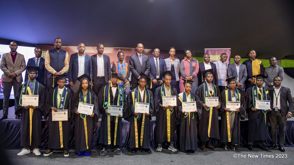 Officials pose for a group photo with graduates at the graduation ceremony for the fifth cohort of the Igire programme on Tuesday, December 19. Photos by Emmanuel Dushimimana