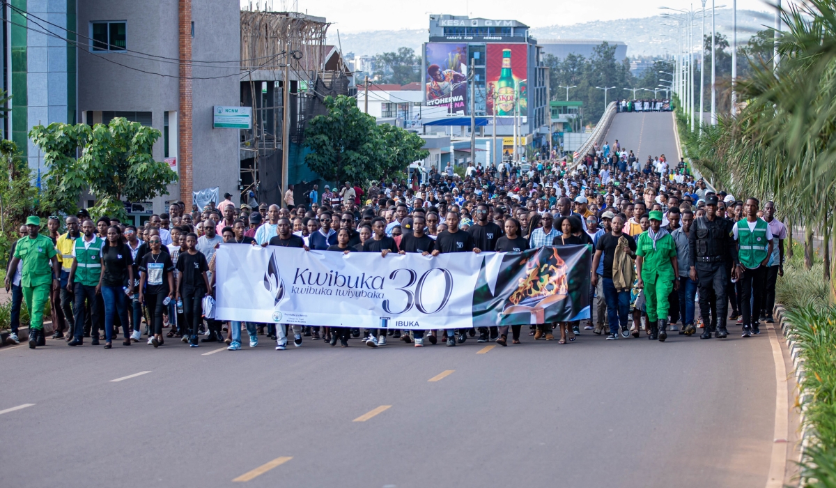 Thousands of mourners during a solemn walk from IPRC-Kigali to Nyanza Genocide Memorial in Kicukiro District as part of the 30th commemoration of the Genocide against the Tutsi on Thursday April 11.  Dan Gatsinzi