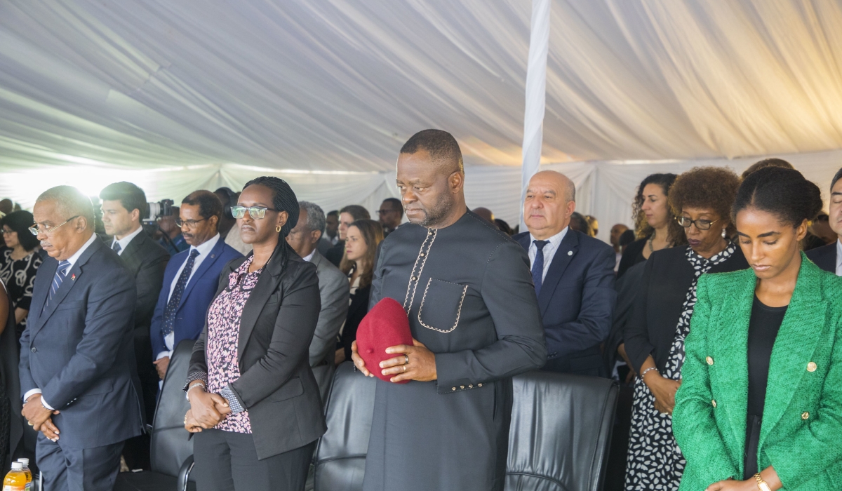 The United Nations in Rwanda employees and other mourners observe a moment of silence to pay tribute to 68 former staff members who were killed during the 1994 Genocide against the Tutsi, in Kigali on Tuesday, April 30, 2024. All photos by  Craish Bahizi