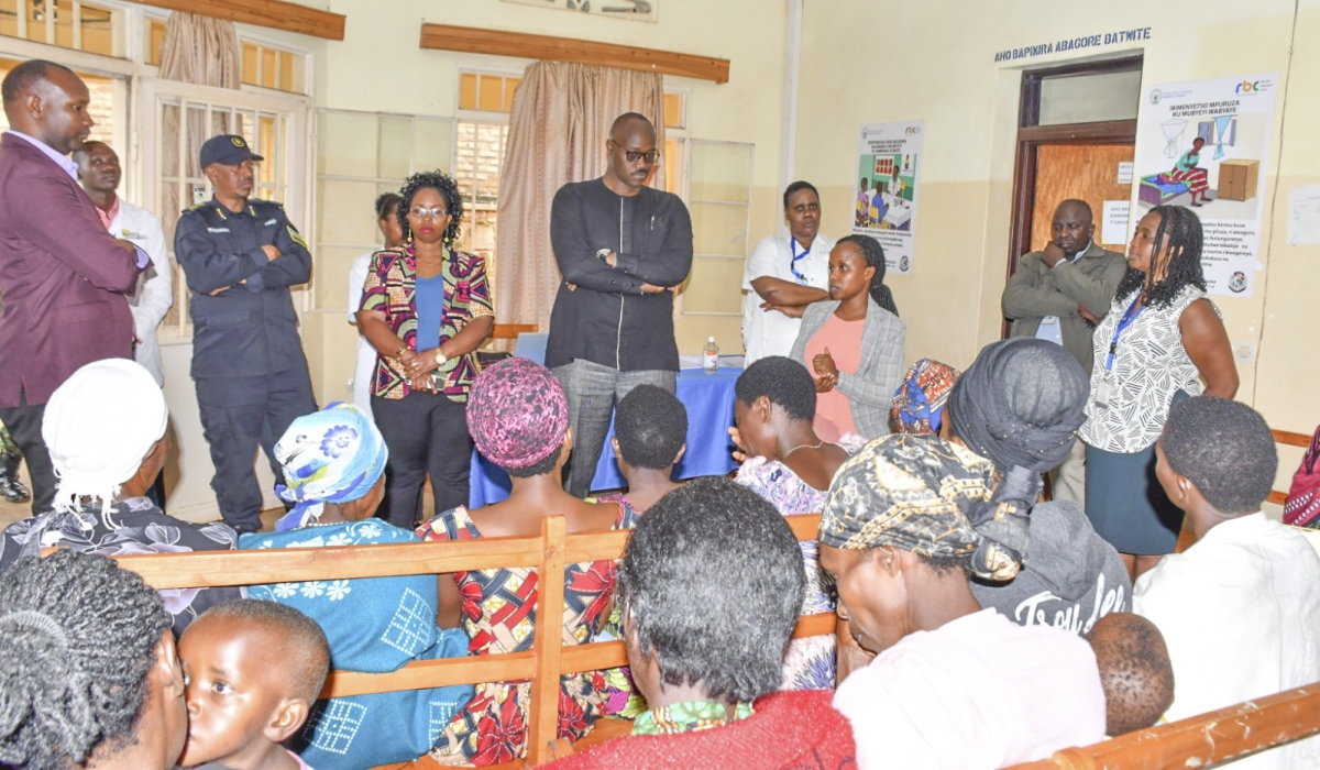 Officials meet women who attended a cervical cancer screening pilot project launch in Ngoma District on Tuesday, April 30. Photo: Courtesy