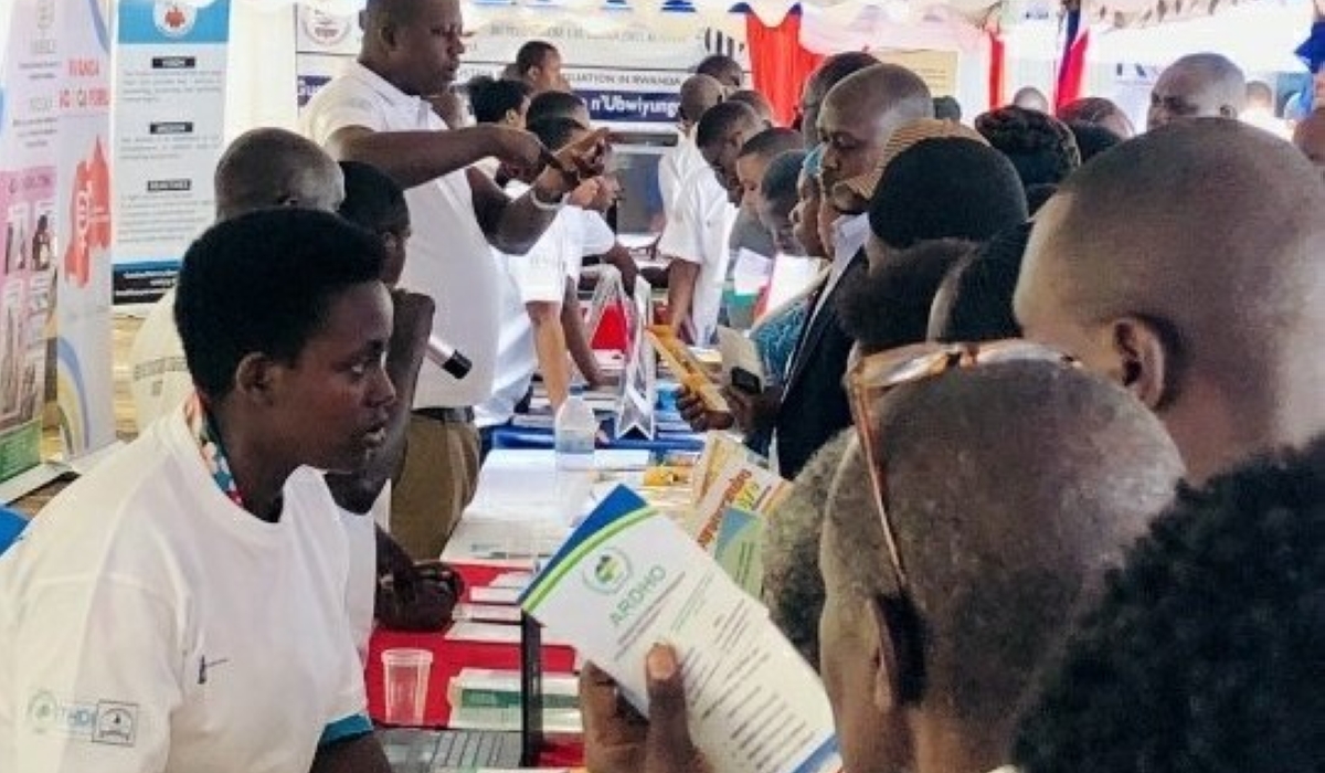 Visitors tour an exhibition organized by Rwanda NGOs forum in Kigali.