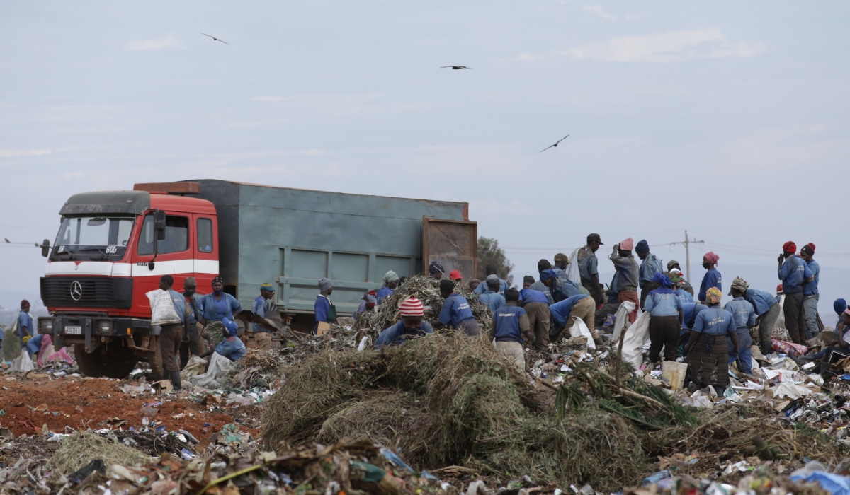 Workers sorting waste at Nduba landfill in Gasabo District. File