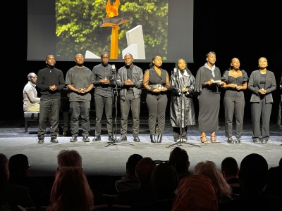 A group of mourners observe a moment of silence in honour of victims of the genocide during  a commemorative event was held in Helsinki, Finland. Courtesy