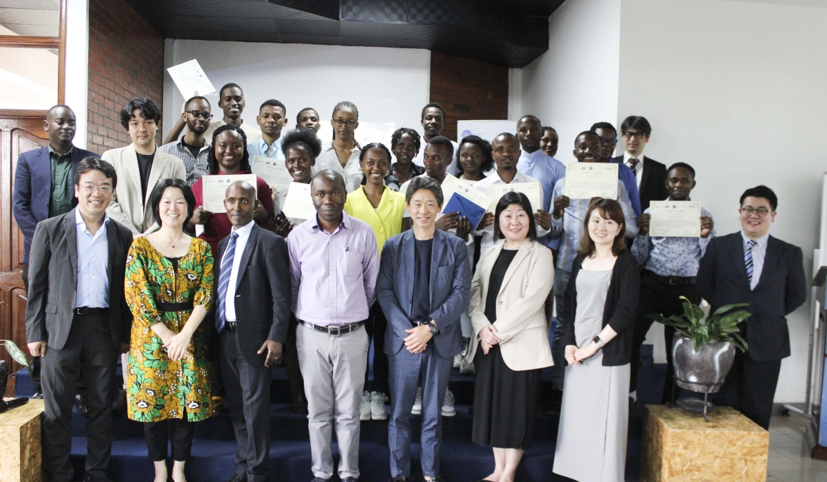 Officials pose for a group photo with participants after receiving the certificates of completion on Friday, May 10, 2024, at a concluding business networking event at the University of Rwanda - College of Science and Technology. Courtesy