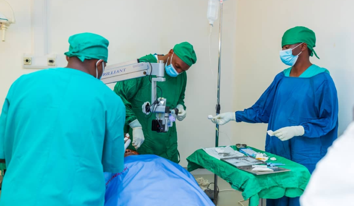 Rwanda Defence Force (RDF) and Ministry of Health medical personnel attend to a patient during the launch of the nationwide programme for treating patients with cataracts,  at Rutongo District Hospital in Rulindo District, on Thursday, May 16.