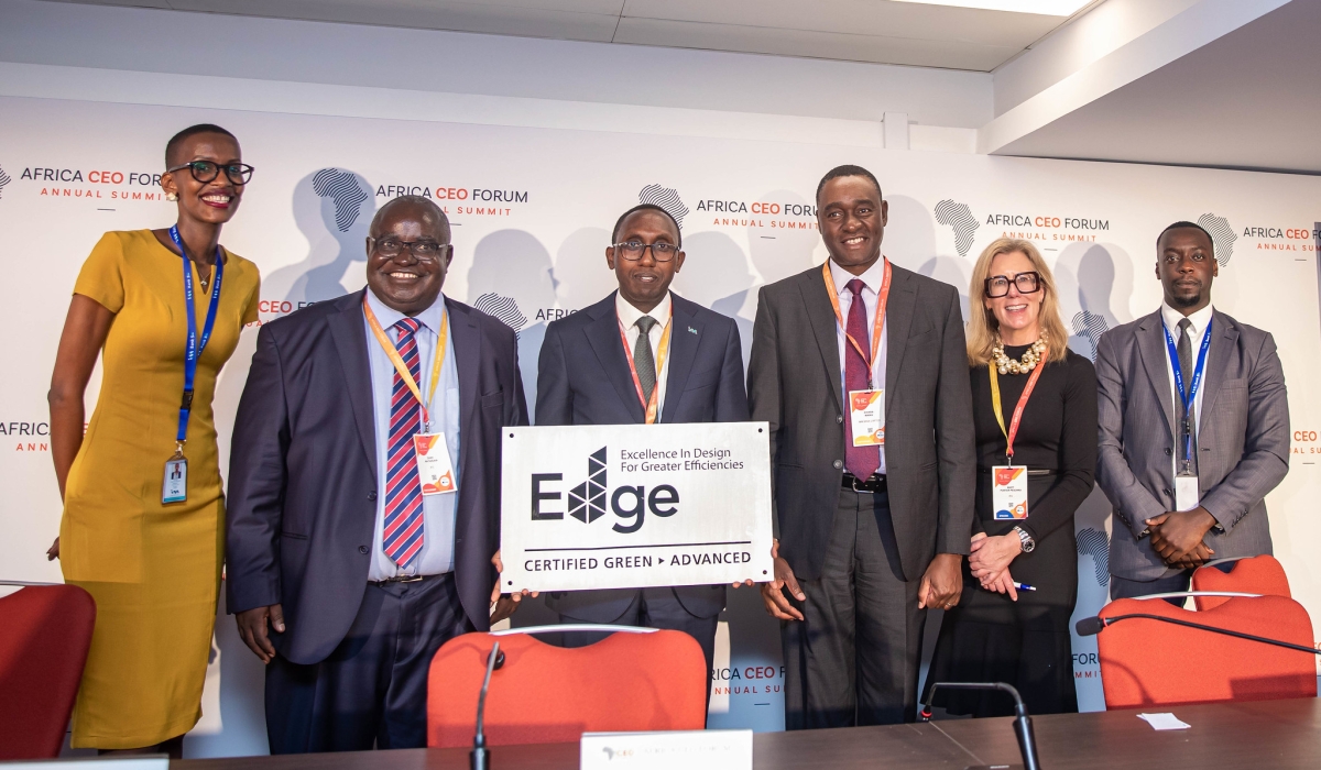 Benjamin Mutimura, CEO of I&M Bank Rwanda (c) holds the EDGE Advanced Certification during an event held on the sidelines of Africa CEO Forum in Kigali on May 16. All photos by Dan Gatsinzi