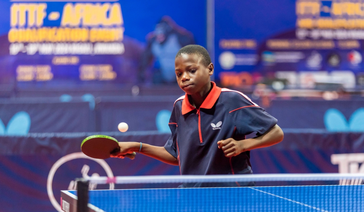12-year-old Ibonga Shukuru traveled all the way from Rubavu to meet his table tennis idol Aruna Quadri who won the ITTF-Africa Cup tournament in Kigali-courtesy