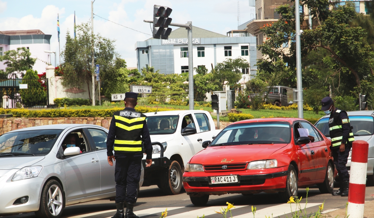 Rwanda National Police&#039;s Traffic and Road Safety Department officers inspect drivers at Gishushu. Craish Bahizi