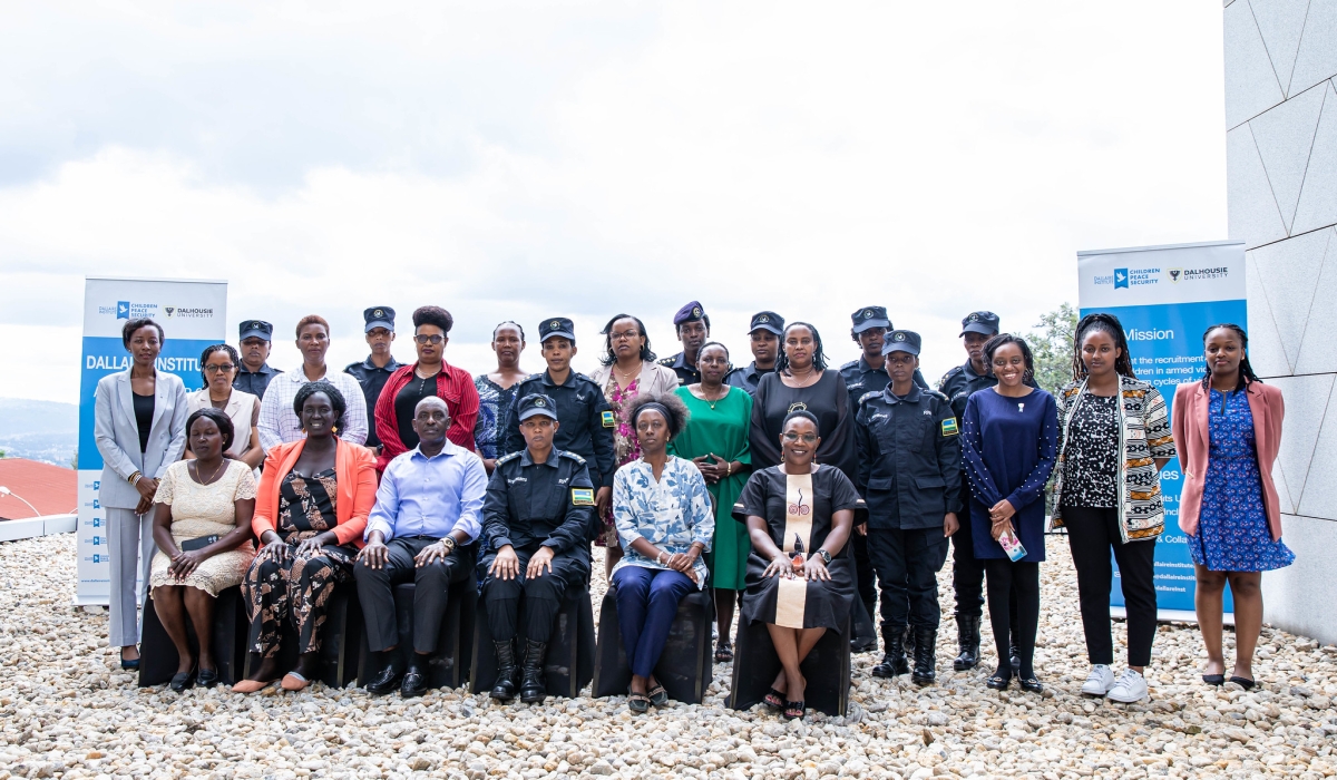 Participants pose for a group photo at a one day workshop in Kigali on May 22. Dan Gatsinzi