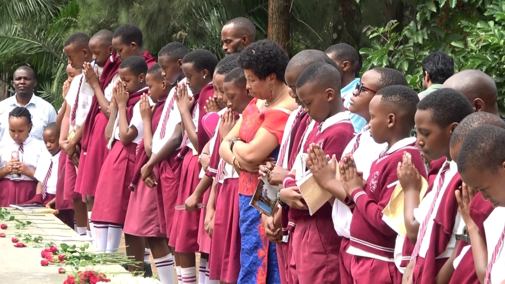 City Infant school students observe a moment of silence to pay tribute to victims of the Genocide against the Tutsi at Kigali Genocide Memorial on May 5. Courtesy