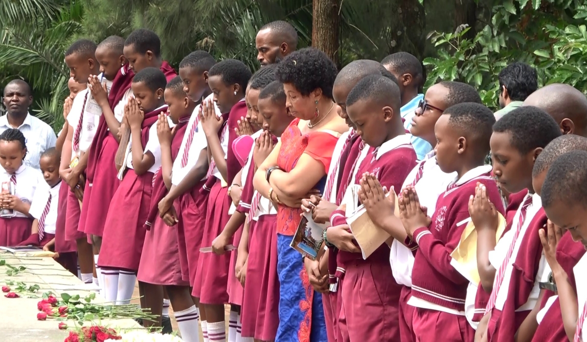 City Infant school students observe a moment of silence to pay tribute to victims of the Genocide against the Tutsi at Kigali Genocide Memorial on May 5. Courtesy