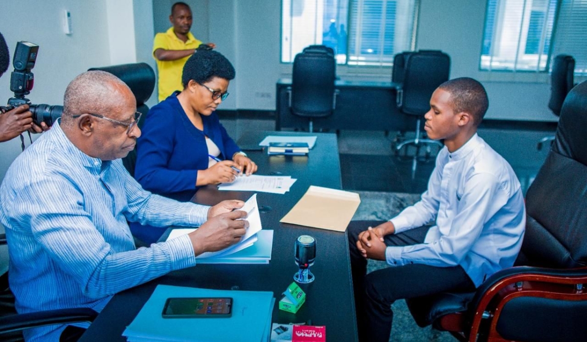 Shallif Ntwari, a second-year university student, submits his candidature ahead of the July elections, on Monday May 27. Courtesy