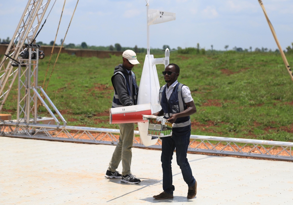 Zipline specialists Edison Niyomurinzi and Egide Rutaganira remove some parts of the drone at Kayonza branch. Sam Ngenda