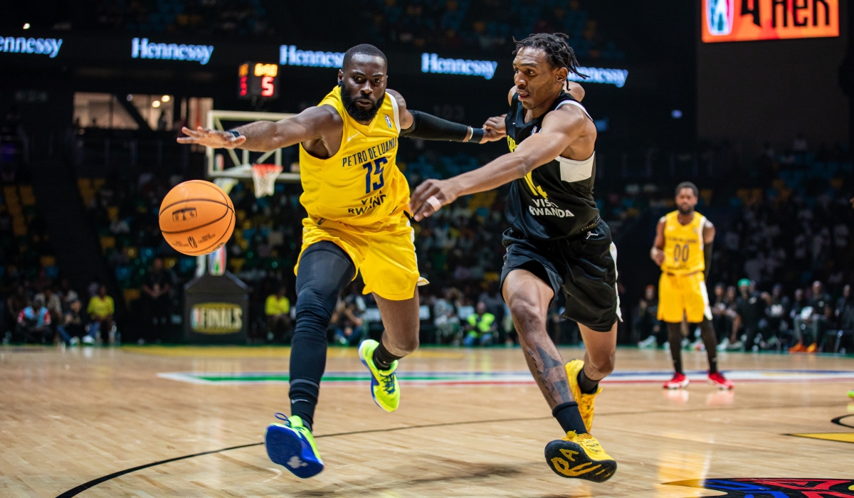 Petro Atletico&#039;s Aboubakar Gakou and Tigers&#039; Nkosinathi Nsibanyoni vie for a ball during the pair&#039;s BAL semifinal game on Wednesday night at BK Arena. Petro will face Libya&#039;s Al Ahly Ly in the final on Saturday, June 1-Dan Gatsinzi.