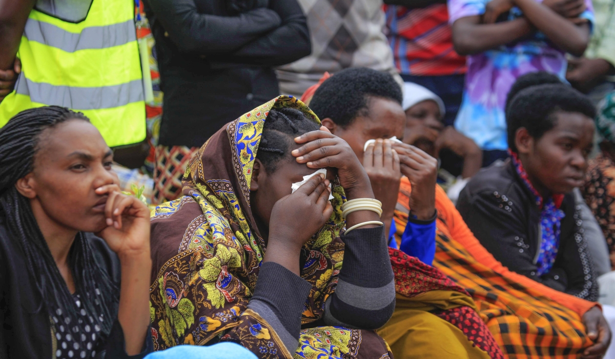 Mourners listen to Susan Nyiranyamibwa&#039;s song &#039; Ayiii ngire nte?&#039; during the commemoration event at Murambi Genocide Memorial in 2017. Photo by Sam Ngendahimana