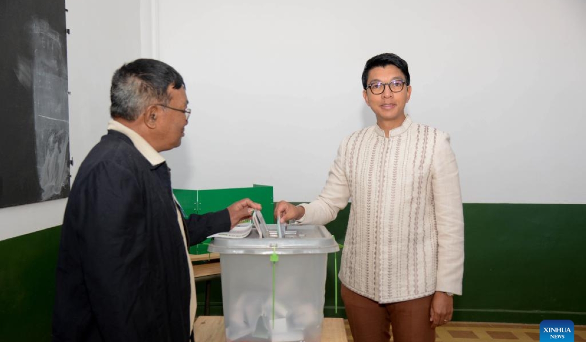 Malagasy President Andry Rajoelina (R) casts his vote at a polling station in Antananarivo, Madagascar, on May 29, 2024. The parliamentary election in Madagascar took place on Wednesday, with citizens voting to elect 163 deputies to the National Assembly. (Xinhua/Sitraka Rajaonarison)