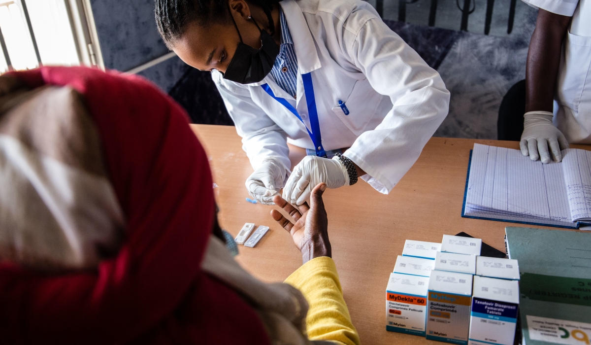 A health worker conducts Hepatitis mass testing exercise at Remera Health Center in Kigali on July 28, 2022. Craish Bahizi