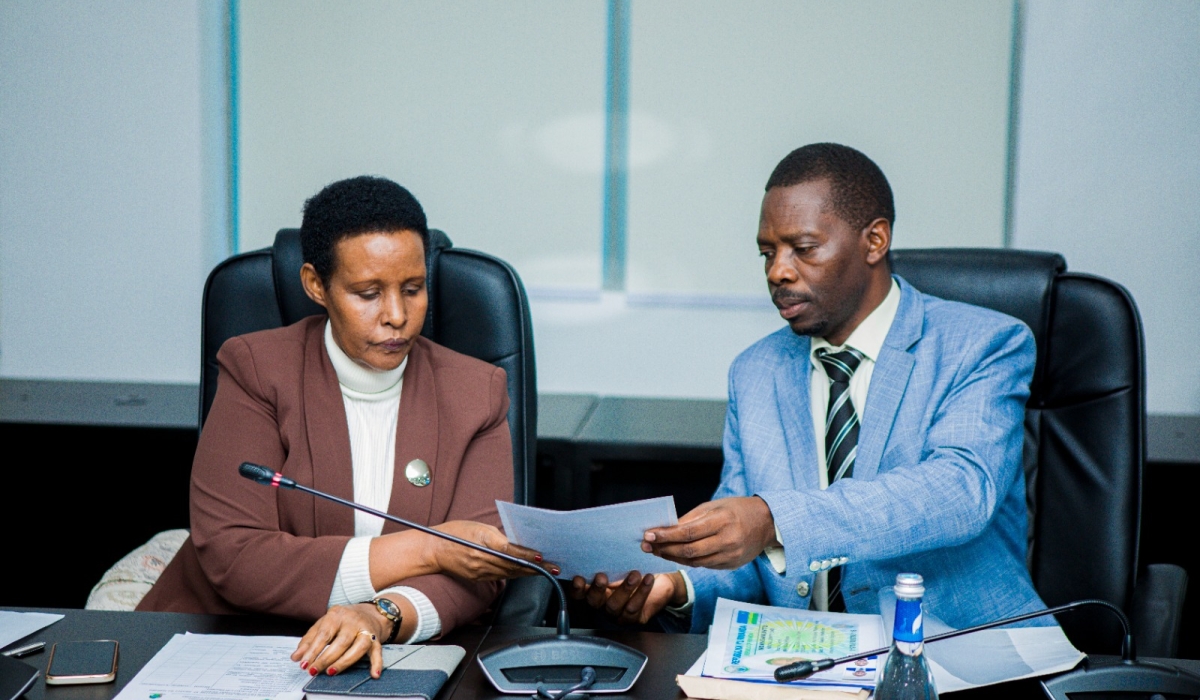 Presidential aspirant Philippe Mpayimana (R) presents his candidature to the Chairperson of the National Electoral Commission, Oda Gasinzigwa,  in Kigali, on May 30, 2024 (courtesy photo).