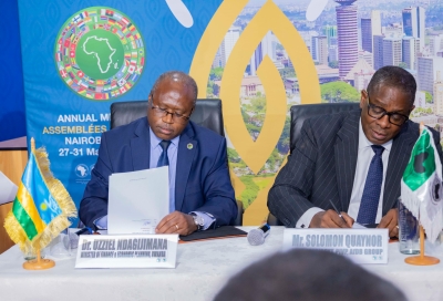 The Minister of Finance and Economic Planning Uzziel Ndagijimana and Solomon Quaynor, Vice-President for Private Sector, Infrastructure and Industrialization at the African Development Bank sign the agreement on the sidelines of  the African Development Bank Annual Meeting in Nairobi, Kenya, on Friday , May 31. Courtesy